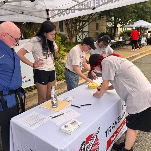 Volunteers At The Table