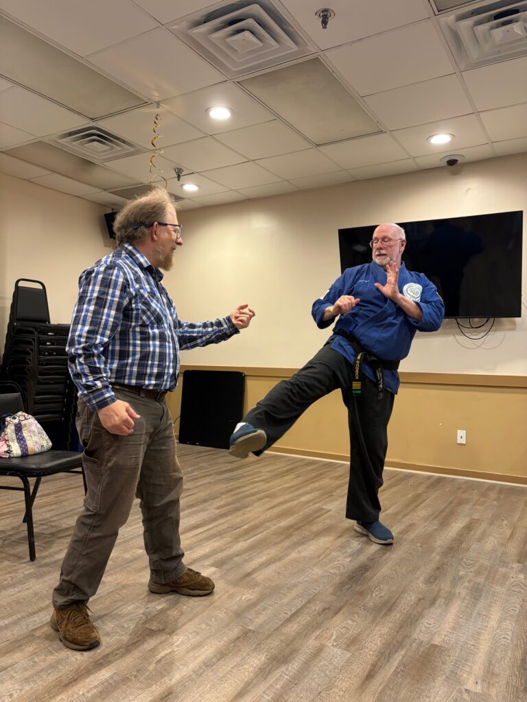 Mark Kicking Martin's Knee