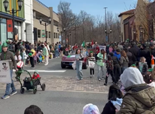 Volunteers Handing Out Candy